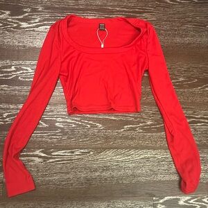 Size XS teen red cute half shirt with long sleeves